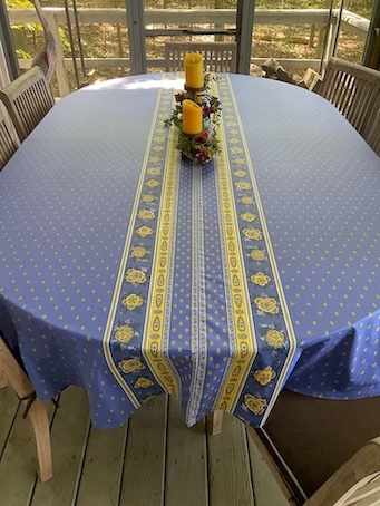 very wide oval tablecloth with a built-in runner