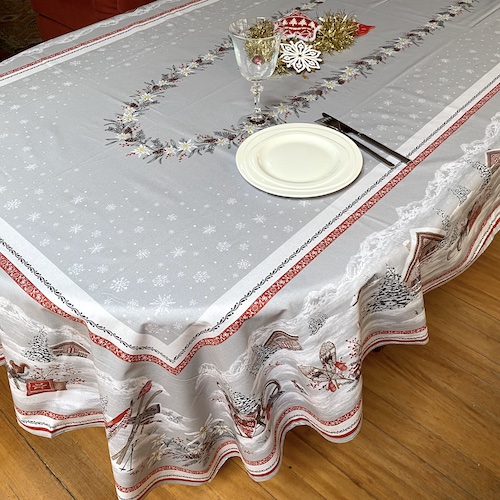 Christmas treated tablecloth with chalets designs