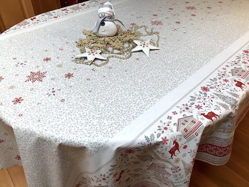 red and white coated christmas tablecloth