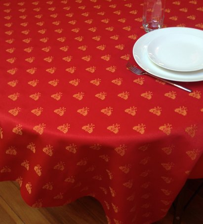 red and yellow french tablecloth with bees designs
