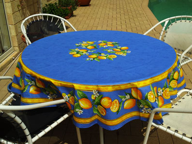 Large round coated tablecloth with lemon design from France.