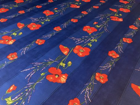 blue provencal coated tablecloth with red poppies designs