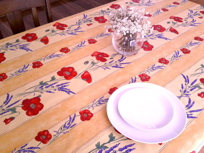 treated French tablecloth with red poppies